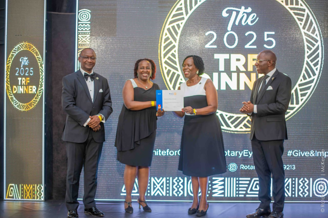 IPDG Anne Receiving Certificates of Excellence on behalf of District 9213